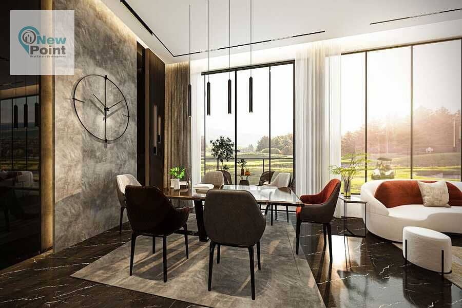 For sale, a two-bedroom apartment with a landscape and lagoon view in the first residential golf project in the Administrative Capital 1