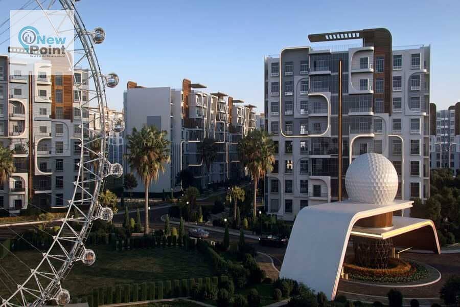 For sale, a two-bedroom apartment with a landscape and lagoon view in the first residential golf project in the Administrative Capital 7