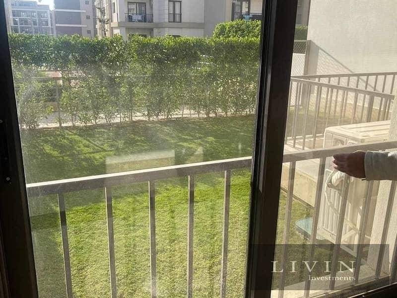 lower than MMHD price - ground apartment with garden 4 bedrooms for sale in taj city new cairo next to gardenis and airport - long term installments 1