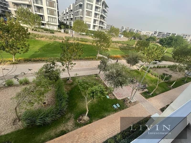 lower than MMHD price - ground apartment with garden 4 bedrooms for sale in taj city new cairo next to gardenis and airport - long term installments 2