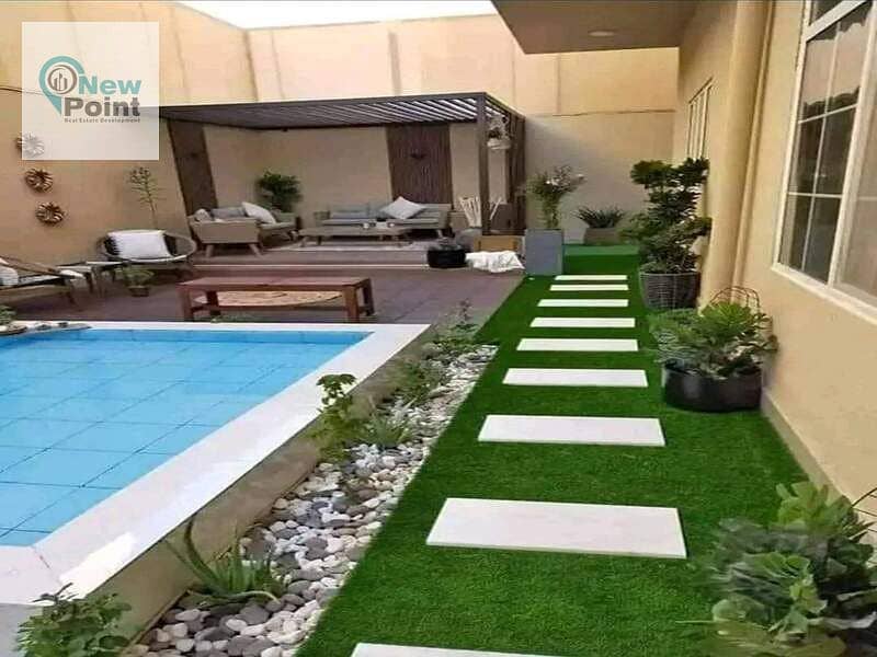 At the lowest price in New Cairo, own a standalone villa, prime location, 5 master rooms, for sale in Sarai Compound, directly in front of Madinaty 6