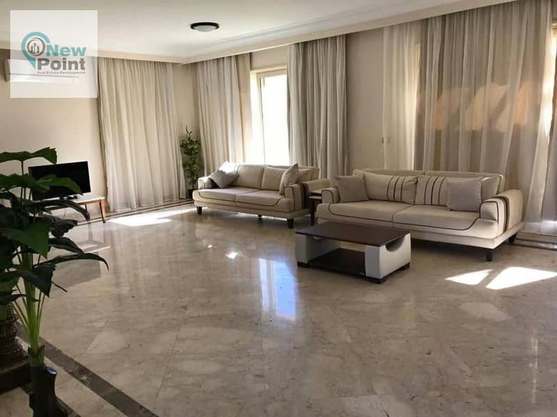 Prime location apartment with a very special view, fully finished, for sale in the most luxurious and highest compounds in New Cairo, Swan Lake Hassan 2