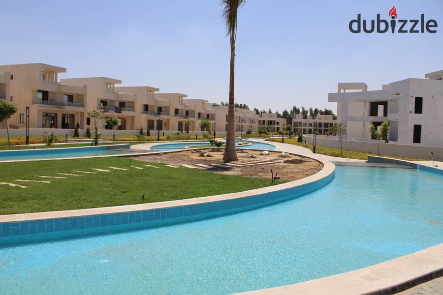 A prime townhouse for immediate delivery in Lake West, located on the Dahshour Link in Sheikh Zayed, directly opposite Beverly Hills. 12