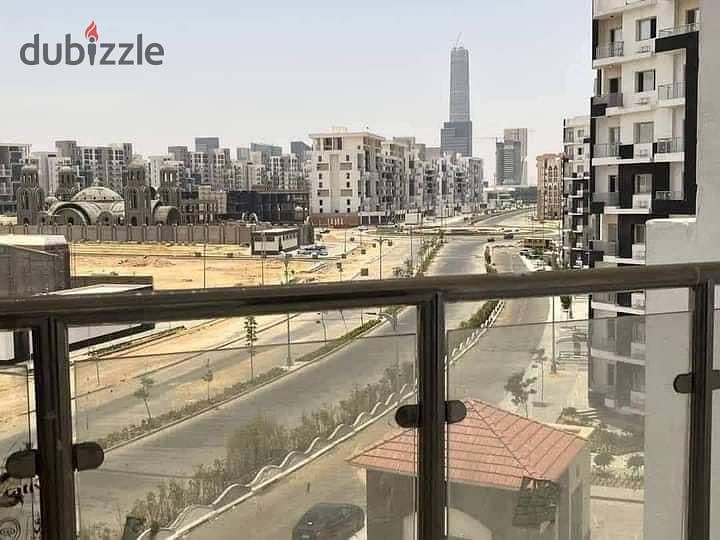 Resale apartment, a great deal, 135 square meters, north view, iconic tower, modern buildings, Al-Maqsad compound, Administrative Capital, at the old 4