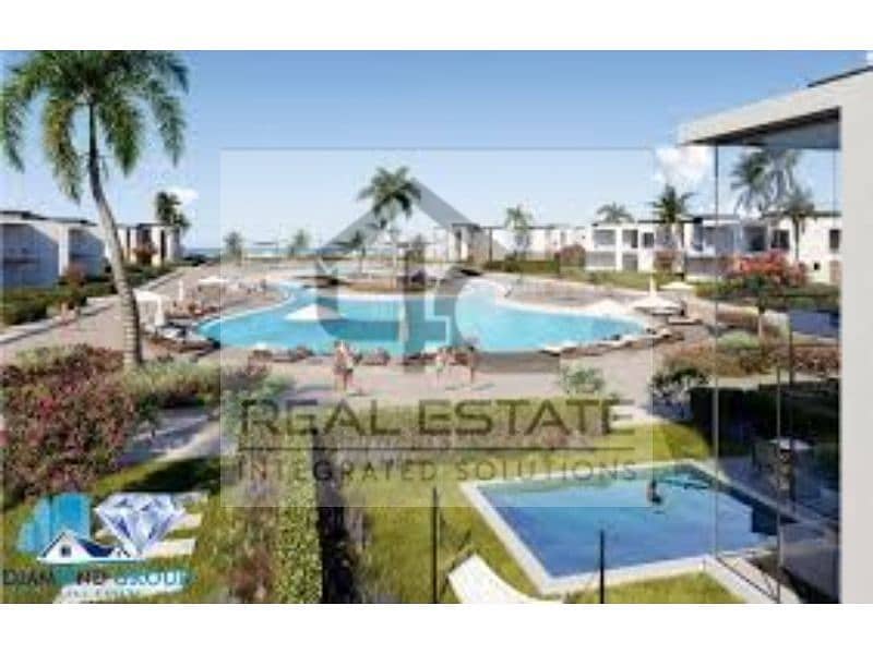 Chalet with old contract, lowest price, fully finished, second floor with elevator, double view, lagoon front and back 6