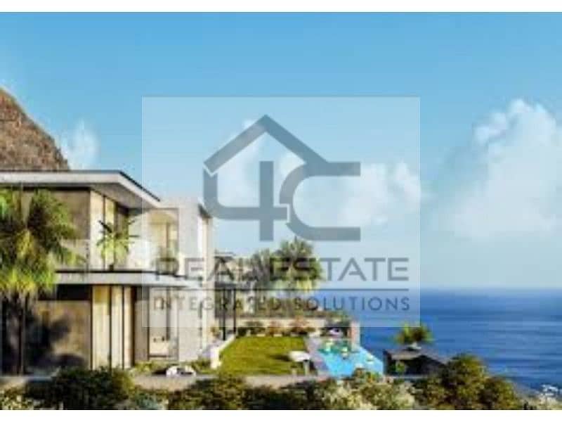 Chalet with old contract, lowest price, fully finished, second floor with elevator, double view, lagoon front and back 10