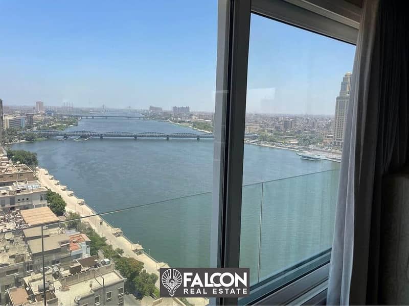 For sale, first row apartment on the Nile, in front of Dahab Island, next to the Egyptian Museum, immediate receipt, fully finished, with air conditio 6