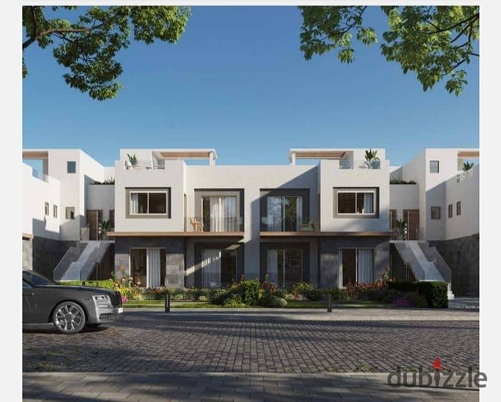 Live in Old Sheikh Zayed in a distinguished location and compound, double view from Dunes, in installments 10