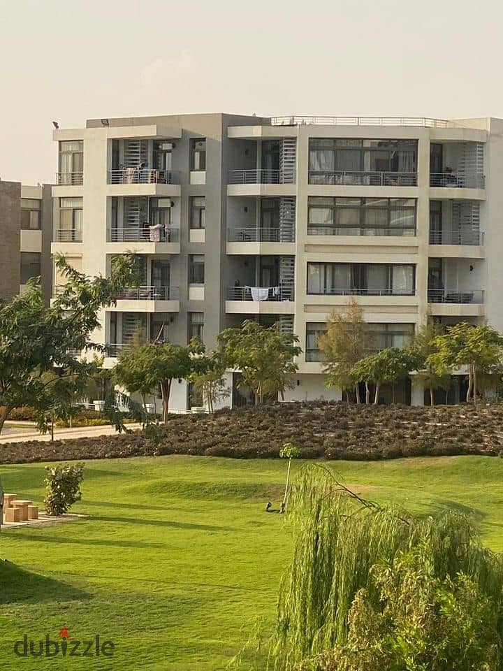 Apartment with garden for sale in Taj City Compound with a down payment of 930 thousand 7