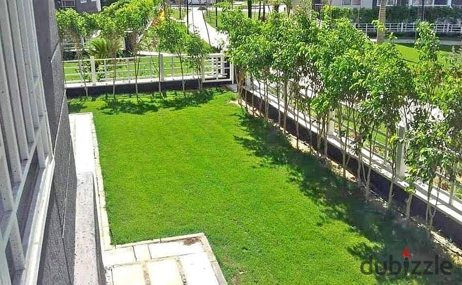 Apartment with garden for sale in Taj City Compound with a down payment of 930 thousand 8