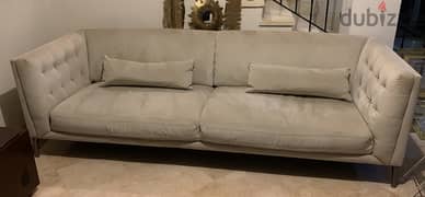 Light grey couch w/ matching pillows and loveseat 0