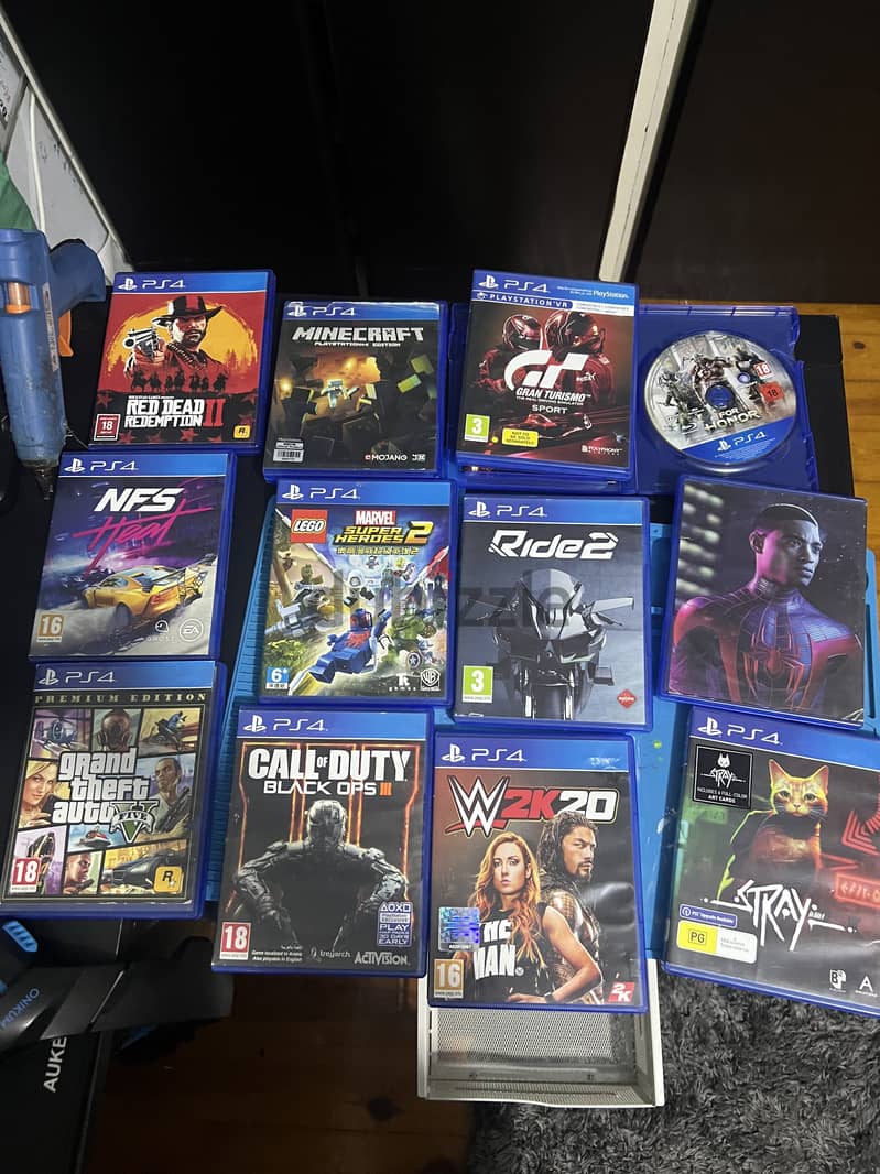 Ps4 slim 2 controllers 12 games ps  bag charging dock 800GB 5