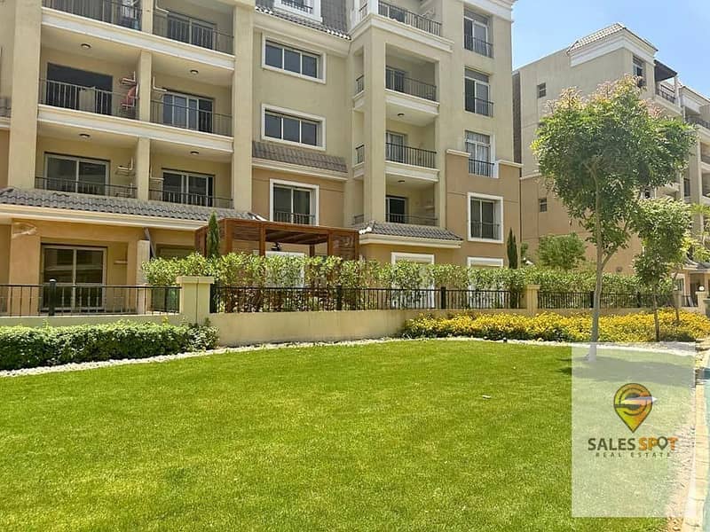 A 144 sqm apartment with a garden at half the price for sale in Sarai Compound, minutes from the Fifth Settlement 2