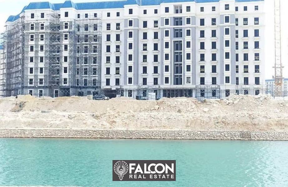 An apartment for sale in Latin City on Lake Alamein, fully finished, with an area of 232 square meters, featuring 4 rooms and a lagoon view 7