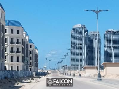 Immediate delivery of a 121 square meter apartment with 3 rooms in Alamein City in the Latin District, featuring lagoon views and complete finishing w