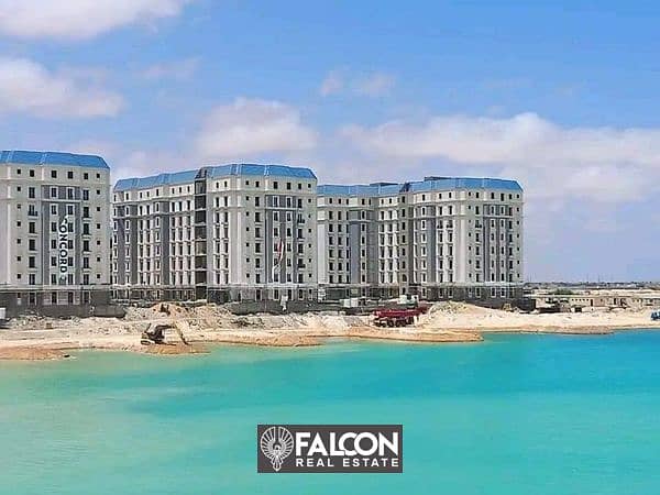 Immediate delivery of a 121 square meter apartment with 3 rooms in Alamein City in the Latin District, featuring lagoon views and complete finishing w 13