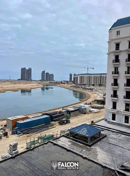 A 198 sqm apartment for sale in the Latin District, Alamein City, with lagoon view, ready for inspection and delivery in a few months. 15% down paymen 1