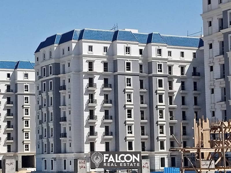 A 198 sqm apartment for sale in the Latin District, Alamein City, with lagoon view, ready for inspection and delivery in a few months. 15% down paymen 10