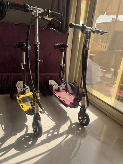 2 electric scooters