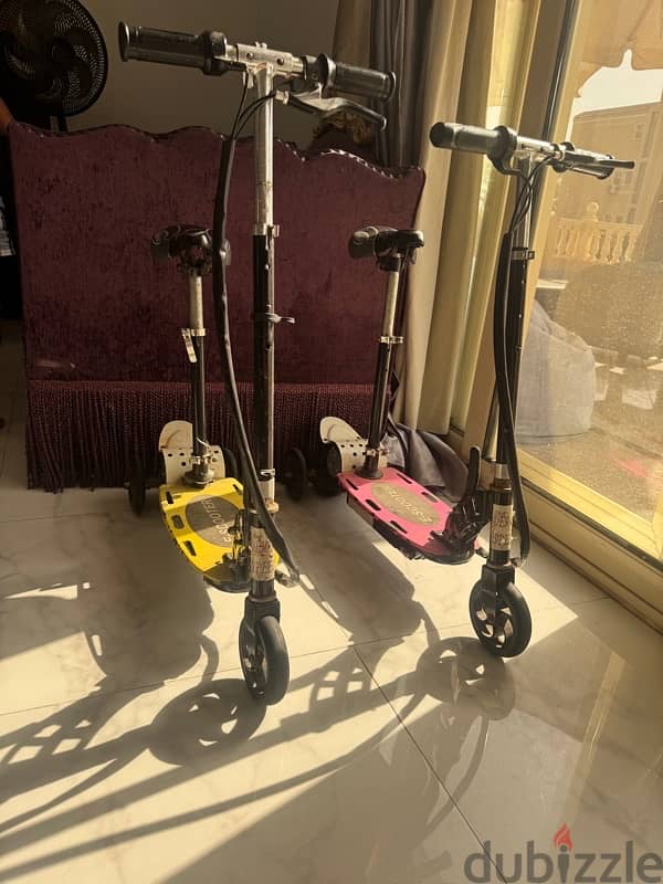 2 electric scooters 1