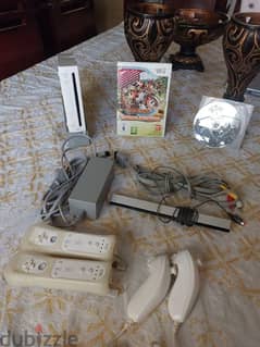 Nintedo wii console with 2 CDS full of entertainment 0