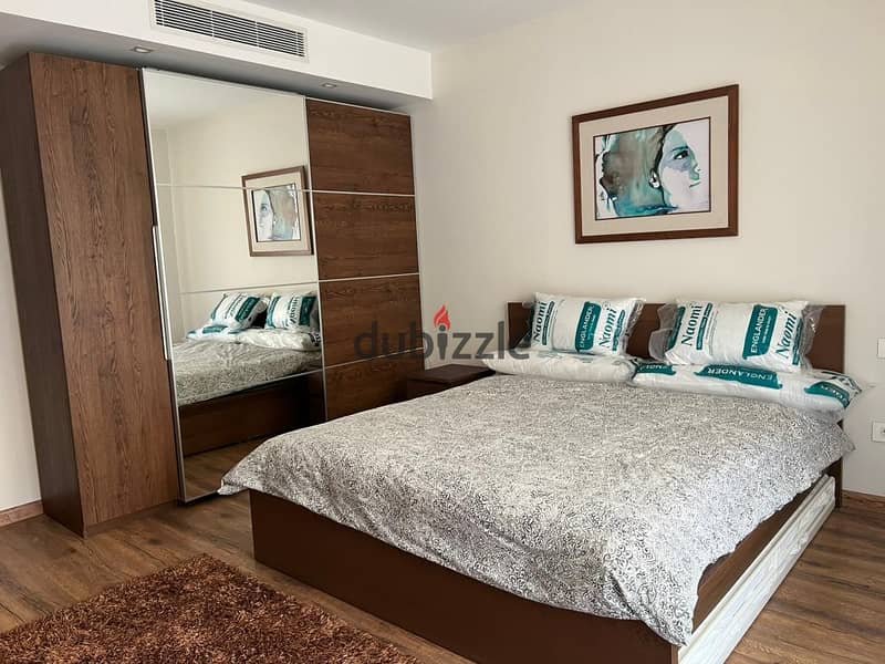 Fully Furnished Apartment with Garden for rent in Cairo Festival City Compound 18