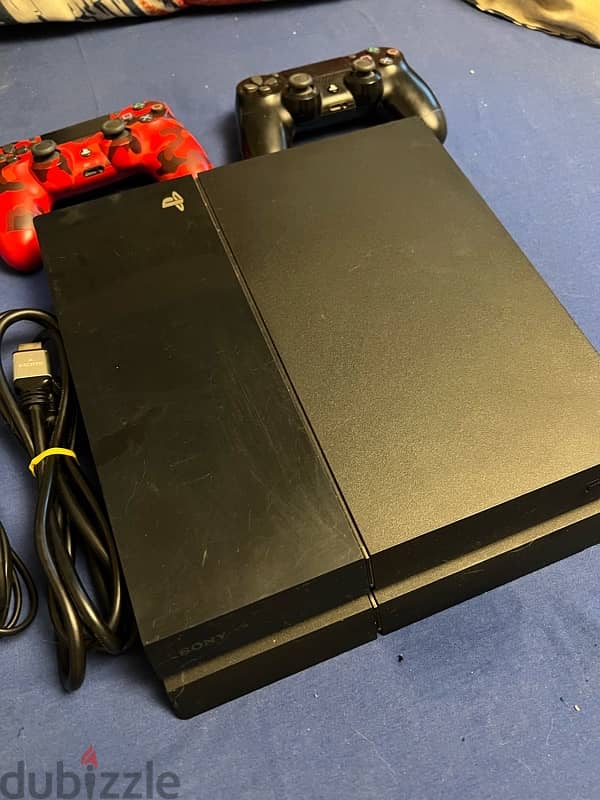 PlayStation 4 Standard + 2 Original Controllers + Games 2