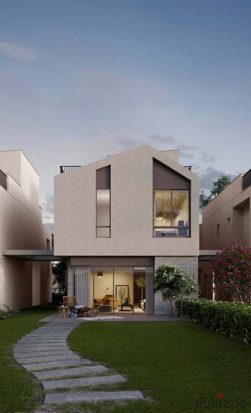 Own a duplex with a garden in Sheikh Zayed in installments over 7 years in SODIC KARMELL 7