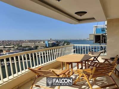 For sale, a hotel apartment overlooking the Nile, immediate delivery, fully finished (air conditioners + appliances) in Maadi, in the Reve Du Nil proj