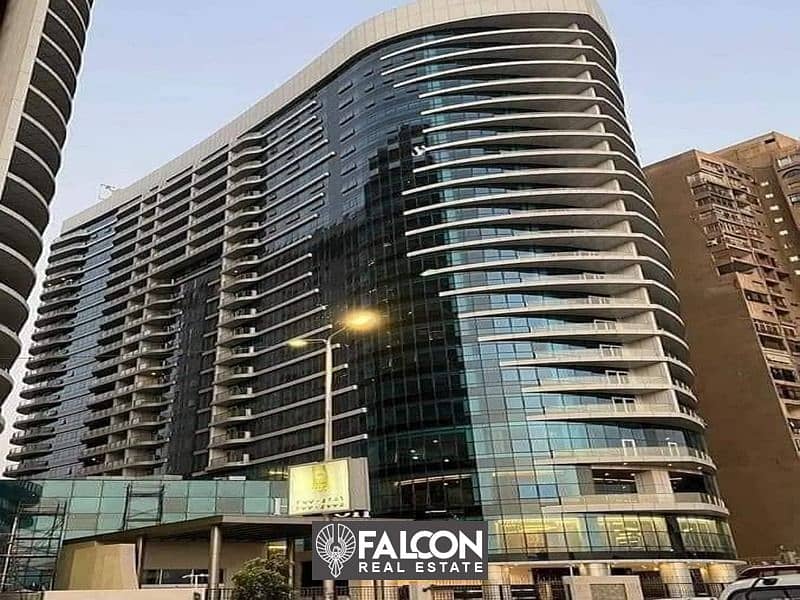 Furnished hotel apartment with appliances and furniture, immediate delivery, 100% view of the Nile, with hotel service next to the Hilton Hotel 0