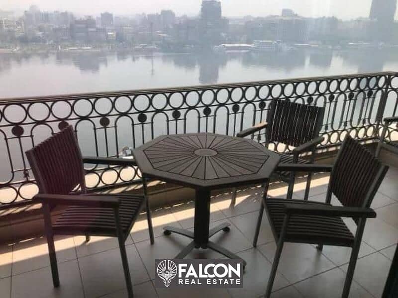 Furnished hotel apartment with appliances and furniture, immediate delivery, 100% view of the Nile, with hotel service next to the Hilton Hotel 6