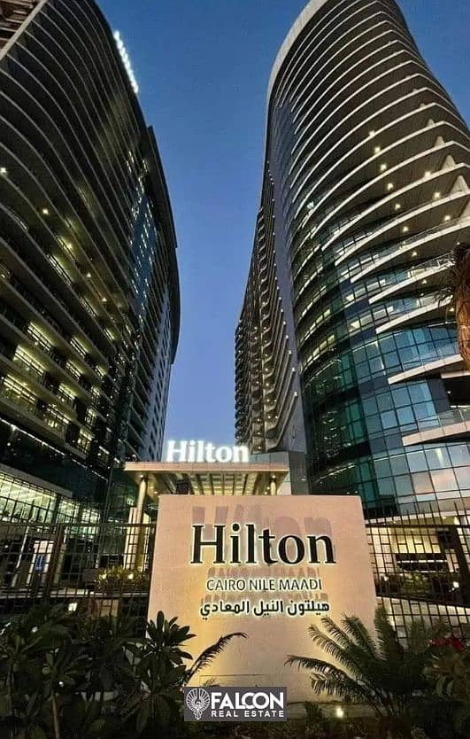 Managed by Hilton Full Nile view apartment fully finished with air conditioners for sale in Maadi Nile Pearl Towers 1