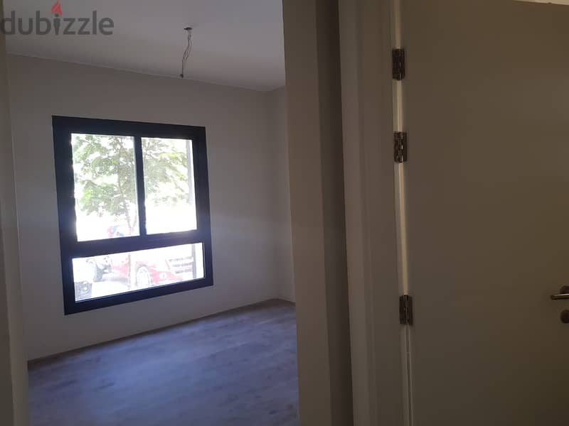 Apartment with garden for rent at Owest شقة بجاردن إيجار بكمبوند أويست 5