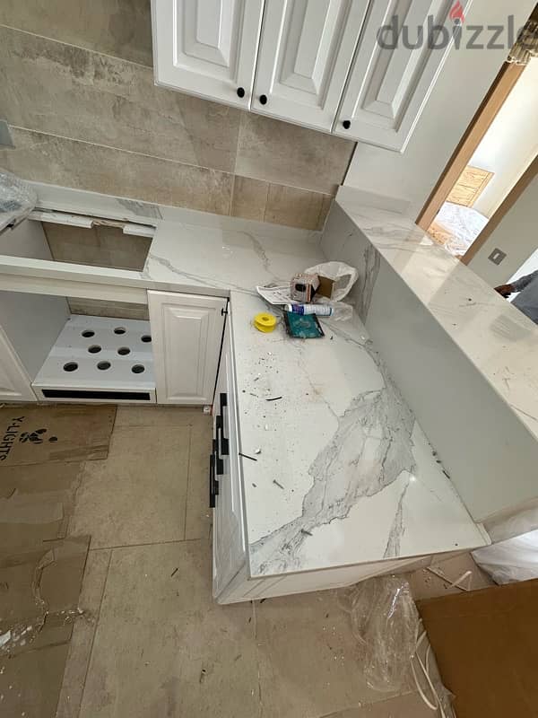 Full wood kitchen with quarts marble 0