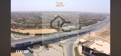 for sale shop 153 m panoramic  view on Nasr Axis, in front of Mountain View 1 installment. 0