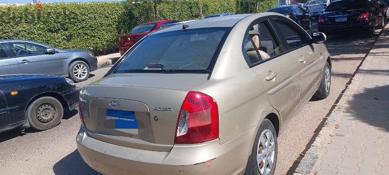 Hyundai Accent 2010 فبريكا بره و جوه مانيوال 1