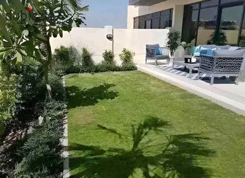 Ground floor apartment with a garden for sale in front of the JW MARRIOTT hotel in the First Settlement, Taj City compound. 2