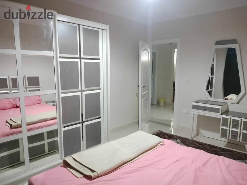 Furnished apartment for rent in Gardenia City Zone 1 on Suez Road next to the airport in Nasr City 1