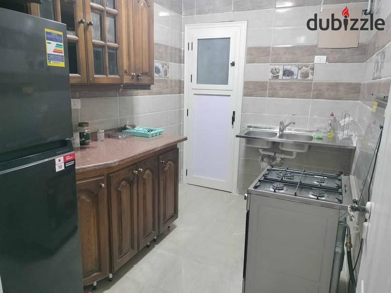 Furnished apartment for rent in Gardenia City Zone 1 on Suez Road next to the airport in Nasr City 5