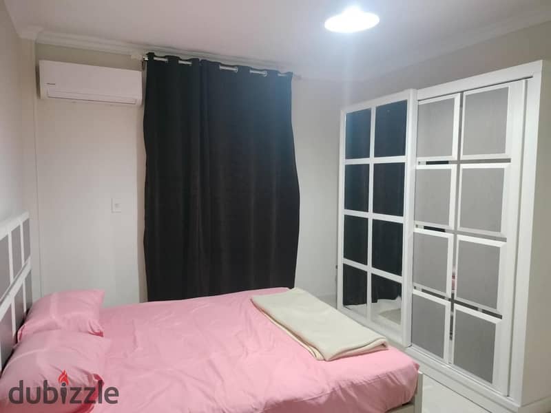 Furnished apartment for rent in Gardenia City Zone 1 on Suez Road next to the airport in Nasr City 6