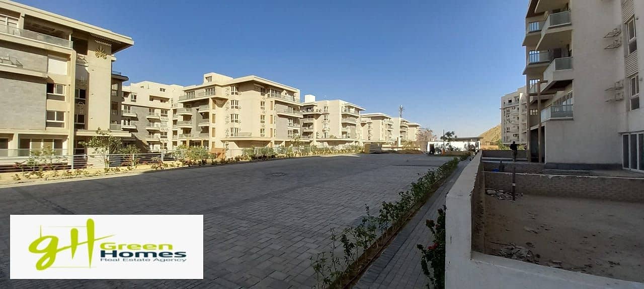 Apartment with garden  for Sale Ready to move with good location at Mountain view icity , New Cairo 1