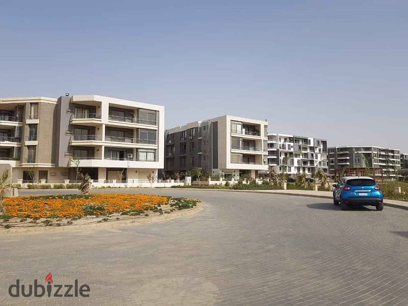 Apartment for sale in front of the Police Academy in the First Settlement, with 42% discount for cash payment, in Taj City. 1