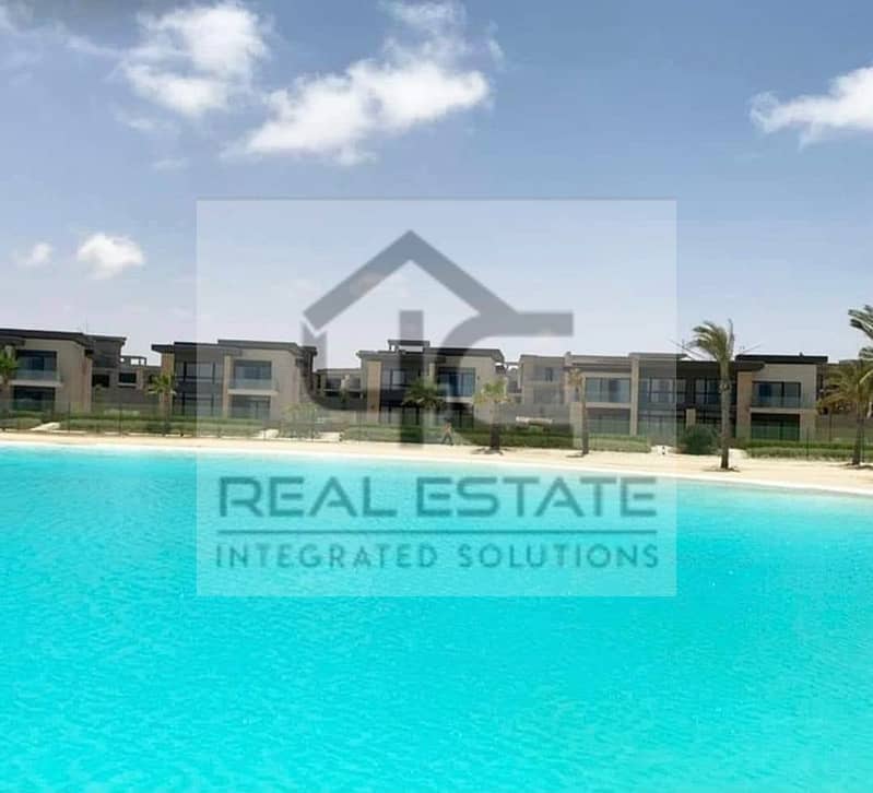 Fully finished townhouse in installments, first row lagoon with garden, open to the largest landscape area 13