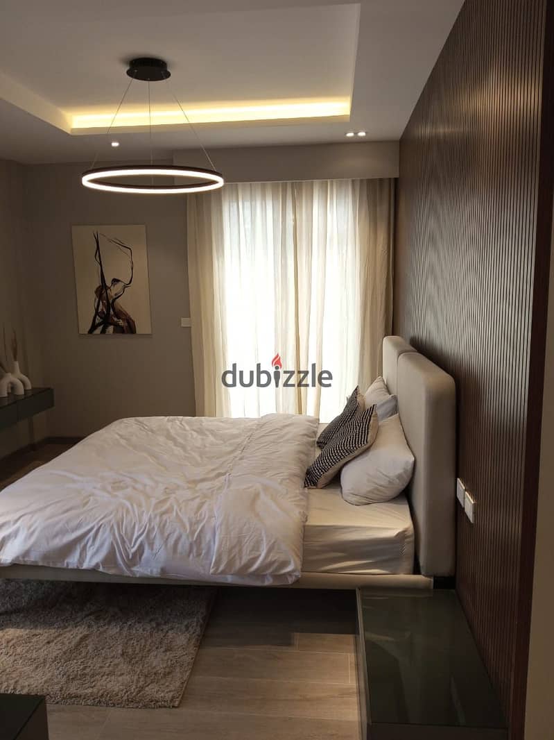 apartment for sale in village west compound sheikh zayed city 7