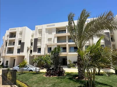 A finished apartment with air conditioners and a kitchen for sale in installments in the heart of the Sheraton, next to Almaza City Center and a minut