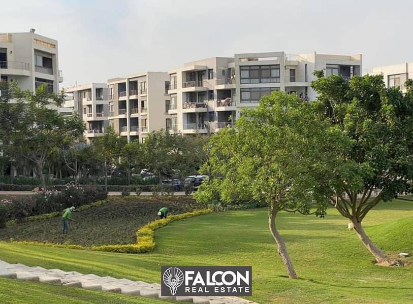 Ground floor apartment with private garden, not promoted, for sale in the most prestigious compound on Suez Road, directly in front of Cairo Airport, 6