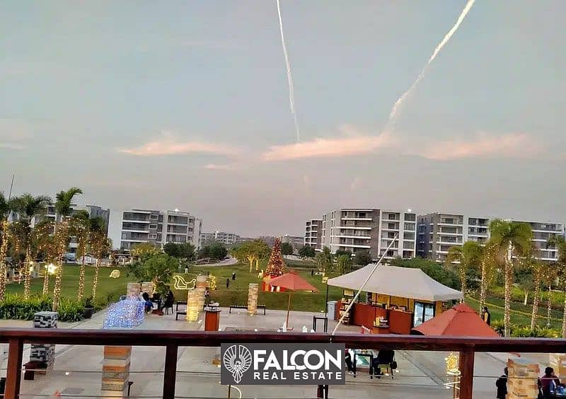 Ground floor apartment with private garden, not promoted, for sale in the most prestigious compound on Suez Road, directly in front of Cairo Airport, 9