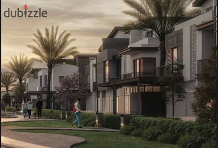 Live in a 3-storey villa with a landscape view, in installments over 9 years, in a prime location in Sheikh Zayed