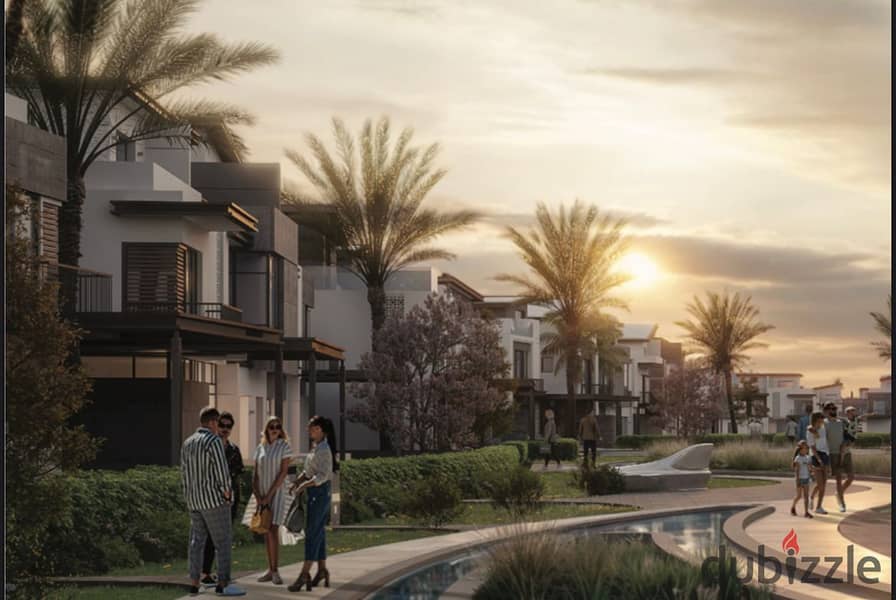 Live in a 3-storey villa with a landscape view, in installments over 9 years, in a prime location in Sheikh Zayed 1