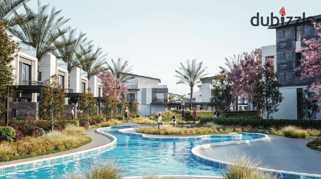 Live in a 3-storey villa with a landscape view, in installments over 9 years, in a prime location in Sheikh Zayed 3